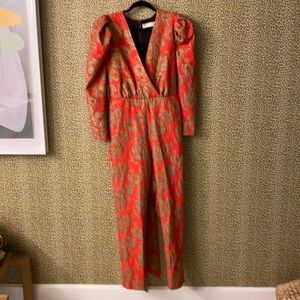 Romper. Dressy and ready for the holiday. Never worn. Size 2.